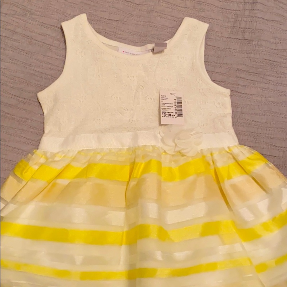 Brand new with tags size 12-18 mths dress
